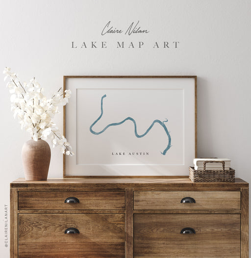 a picture of a lake map on a dresser